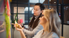 Photo of two women discussing agile product development